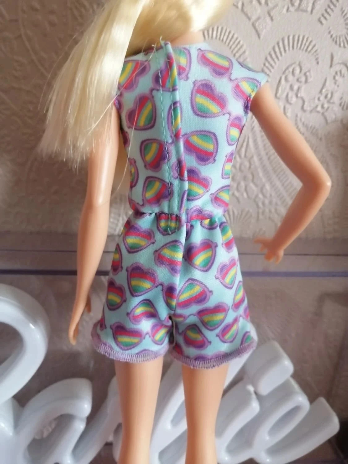 Barbie en un mono corto (combishort) – photo 4
